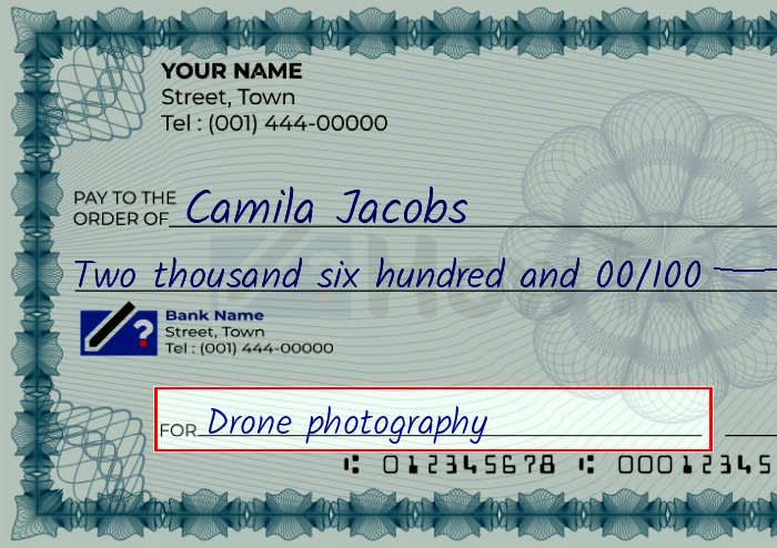 Step 5: Fill out the memo on the 2600 dollar check, showing a check with 'Drone photography' written in the memo field